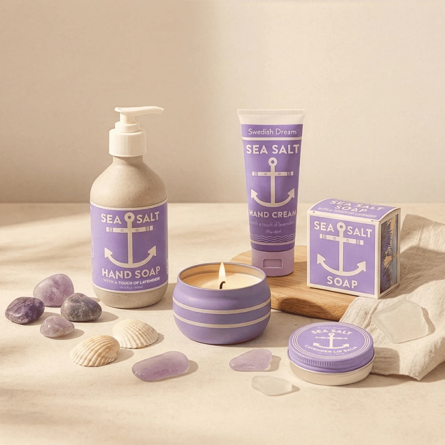 Alternate image of hand cream next to other lavender sea salt products