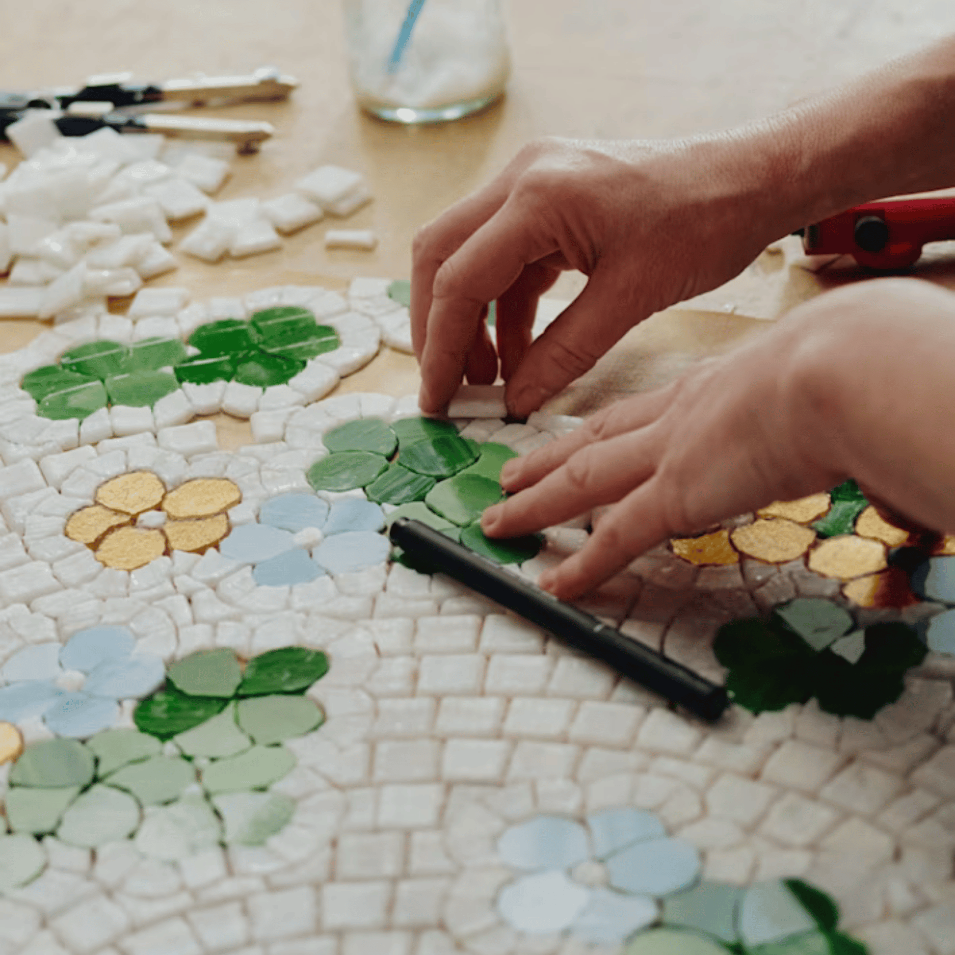 Alternate image of mosaic artist creating product art for Diptyque Limited edition Citronelle and Geranium Summer Body Spray 130ml