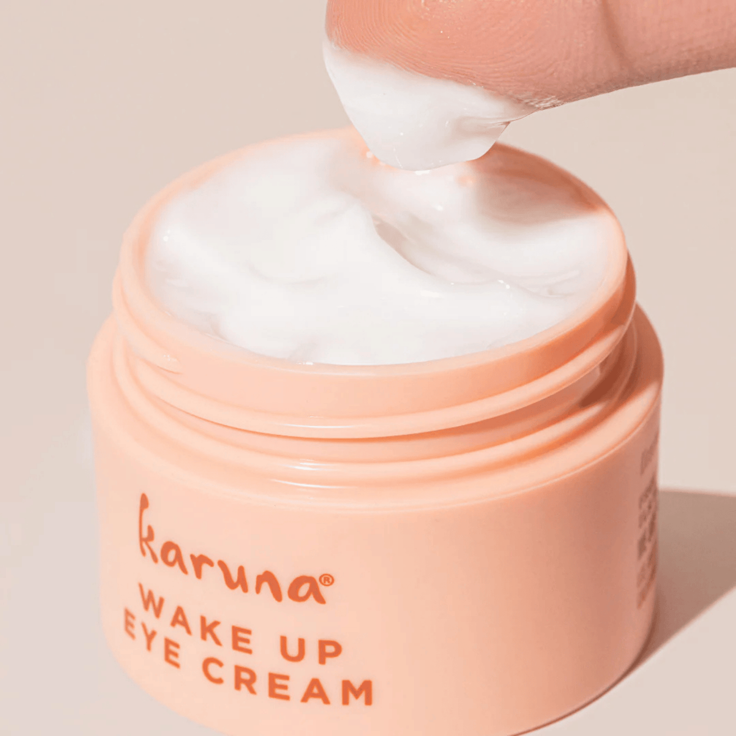 Alternate image, Opened Pink Wake Up Eye Cream jar with cream texture