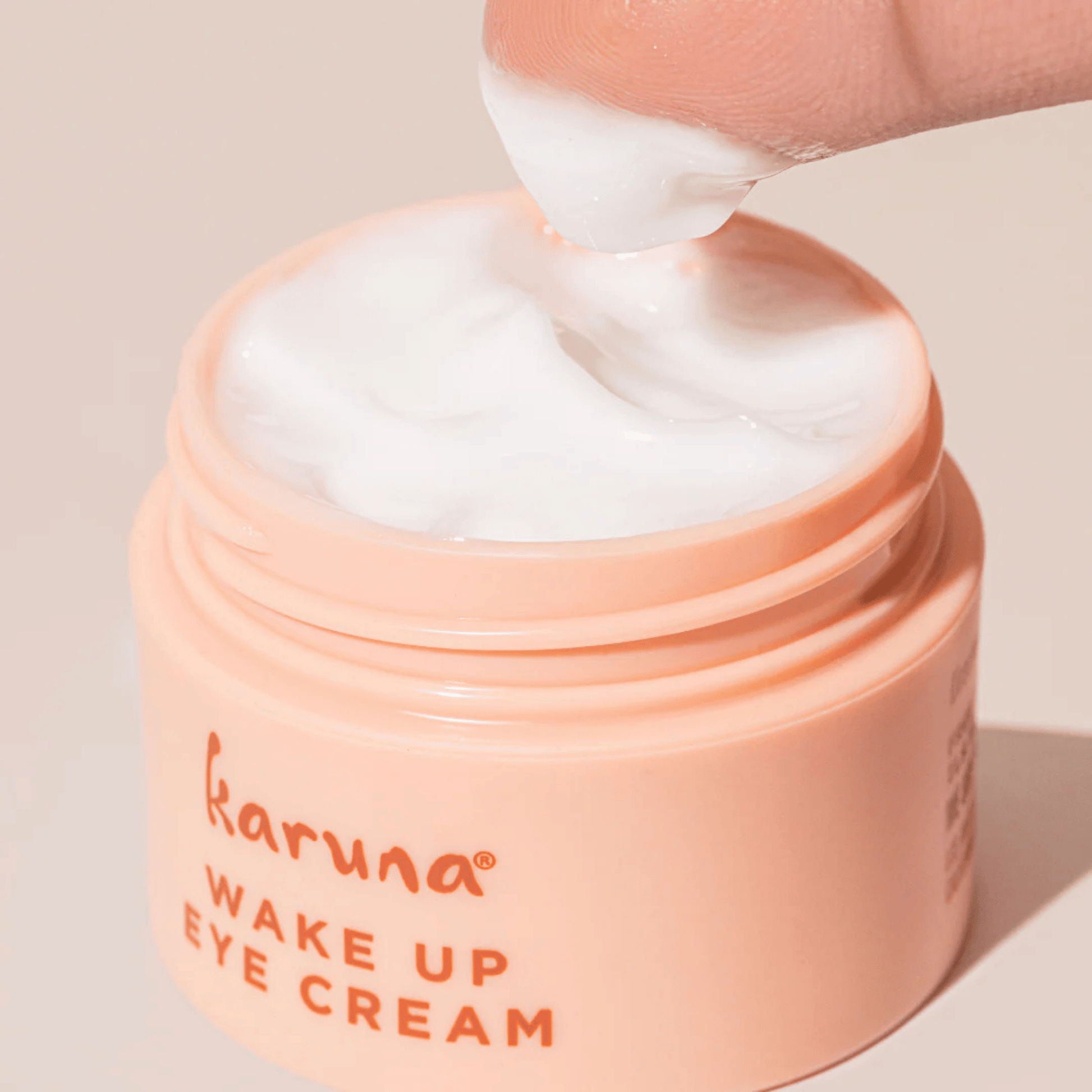 Alternate image, Opened Pink Wake Up Eye Cream jar with cream texture
