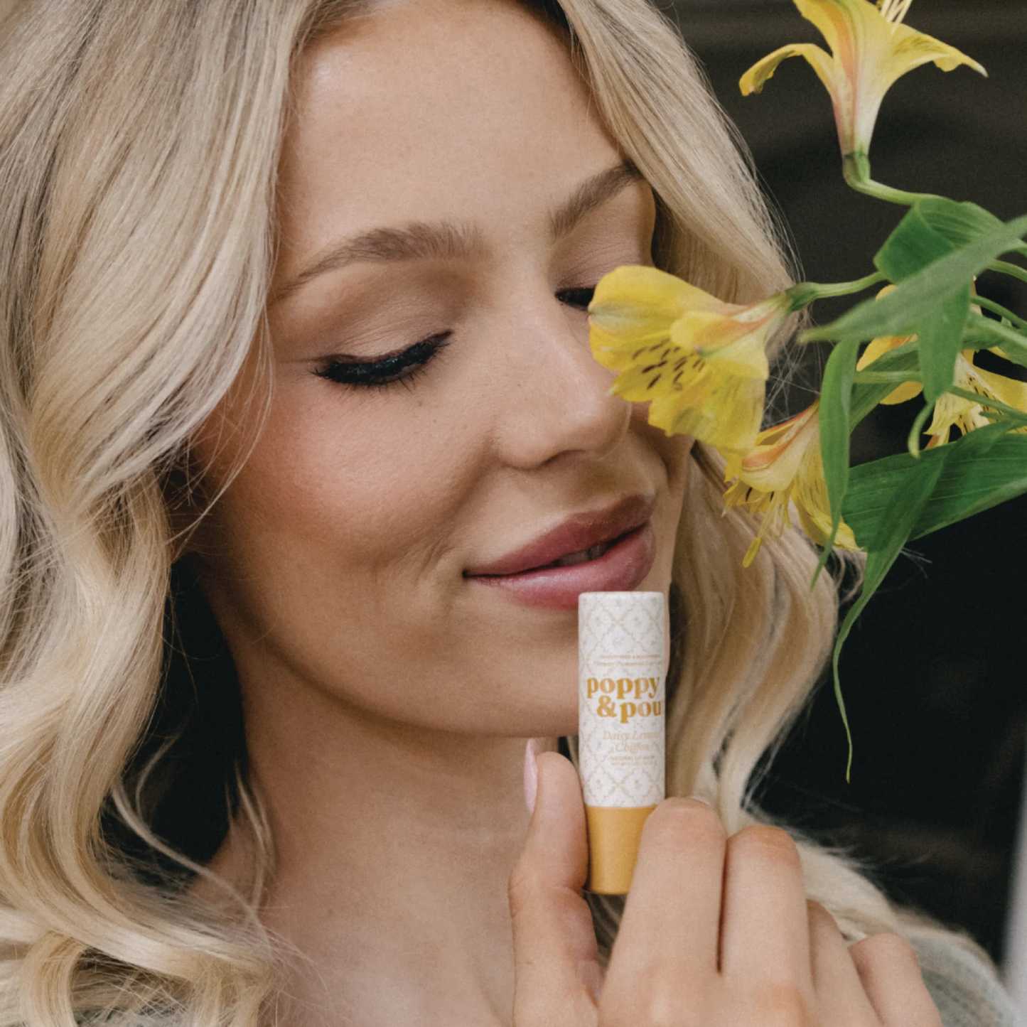 Model image of Poppy & Pout Daisy Lemon Chiffon Cottage Collection Lip Balm
