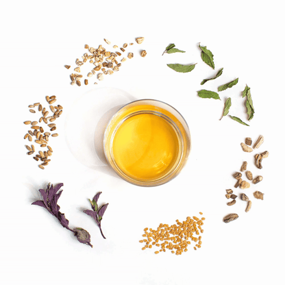Alternate image of cup of tea surrounded by leaves and flowers from the tea