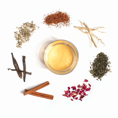 Alternate image of cup of tea surrounded by leaves and flowers from the tea