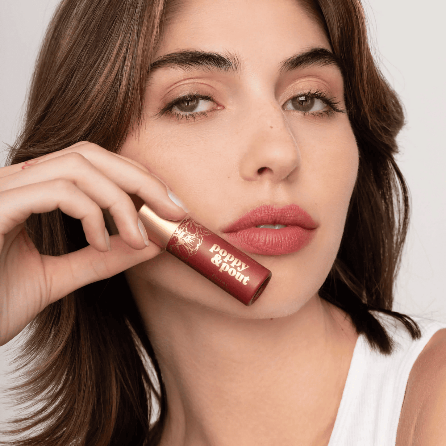 Model image of Poppy & Pout Penny Lip Tint 