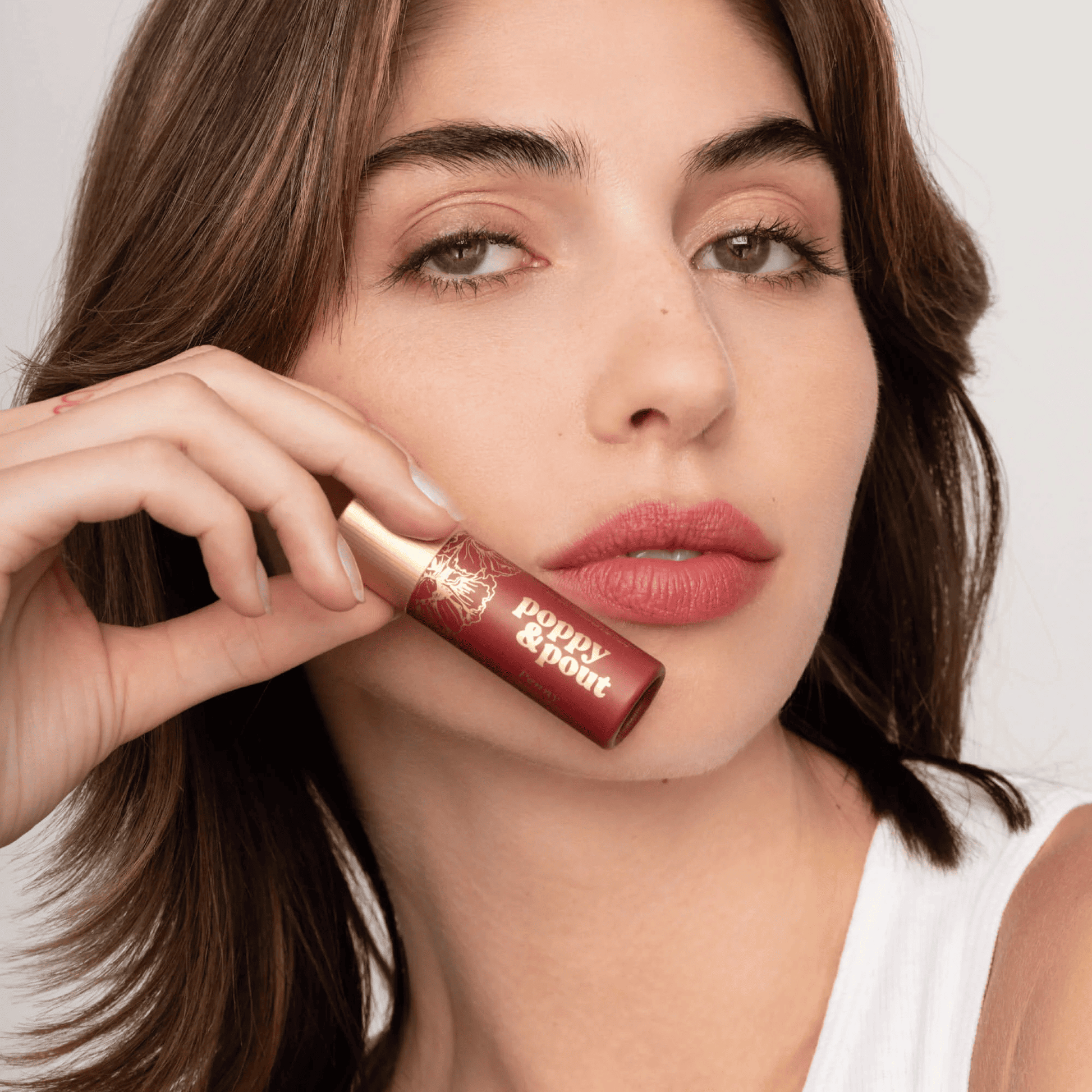 Model image of Poppy & Pout Penny Lip Tint 