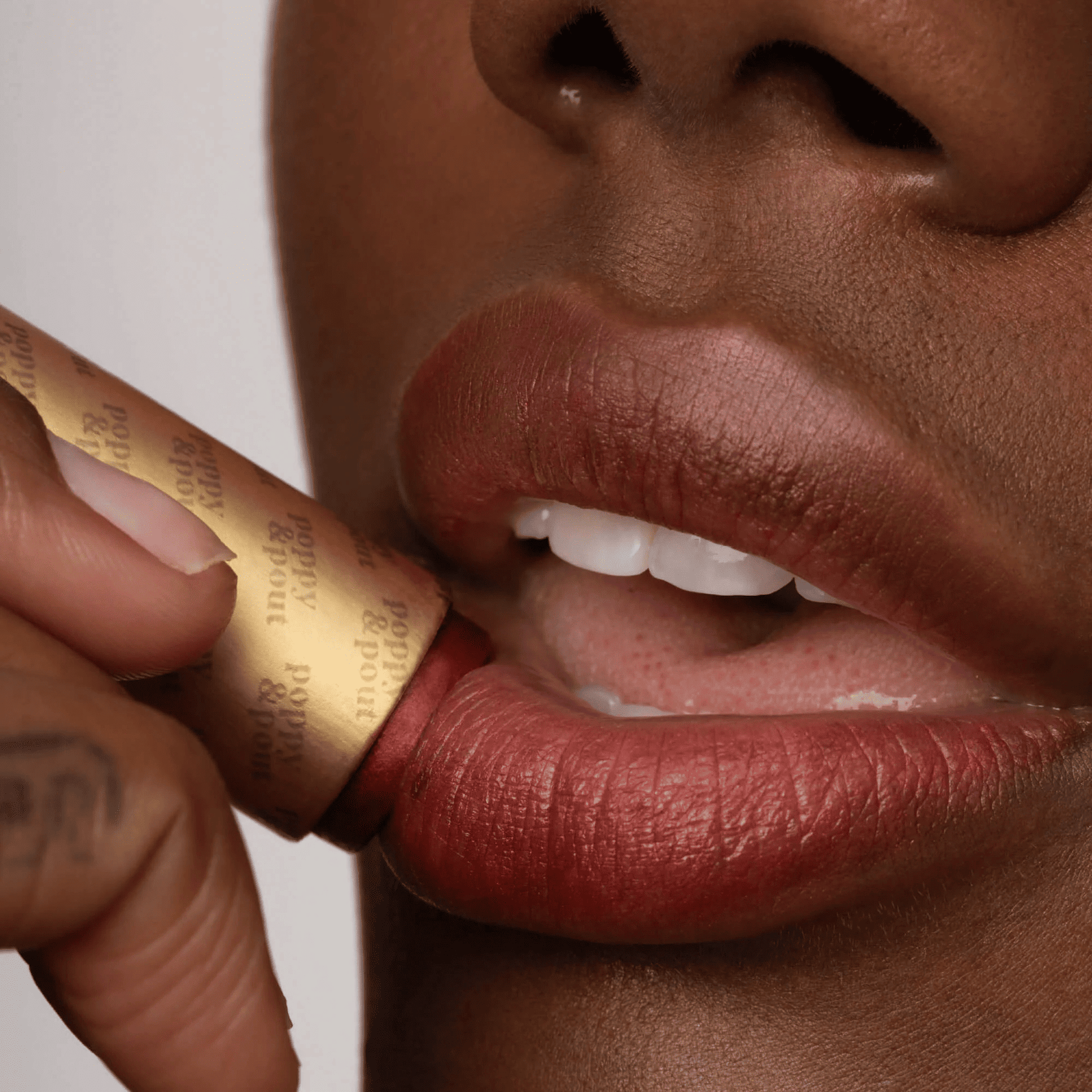Alternate Model image of Poppy & Pout Penny Lip Tint 