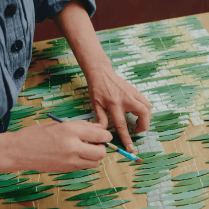 Alternate image of mosaic artist creating product art for Diptyque Limited Edition Pinede Candle