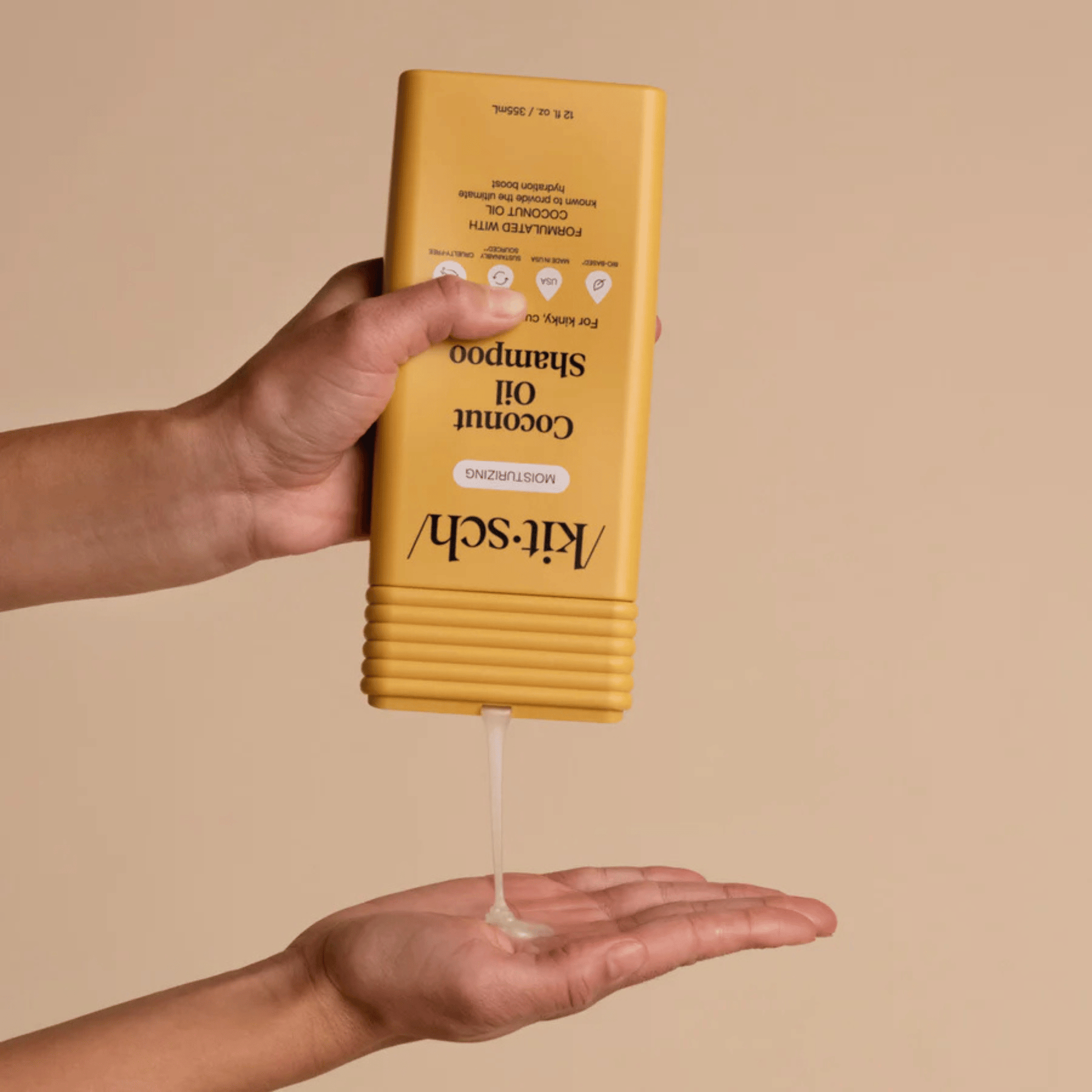 Alternate Image of Moisturizing Coconut Oil Shampoo, orange shampoo bottle