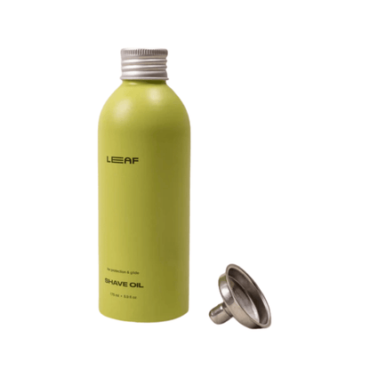 Primary Image of Shave Oil Refill, green aluminum bottle with funnel