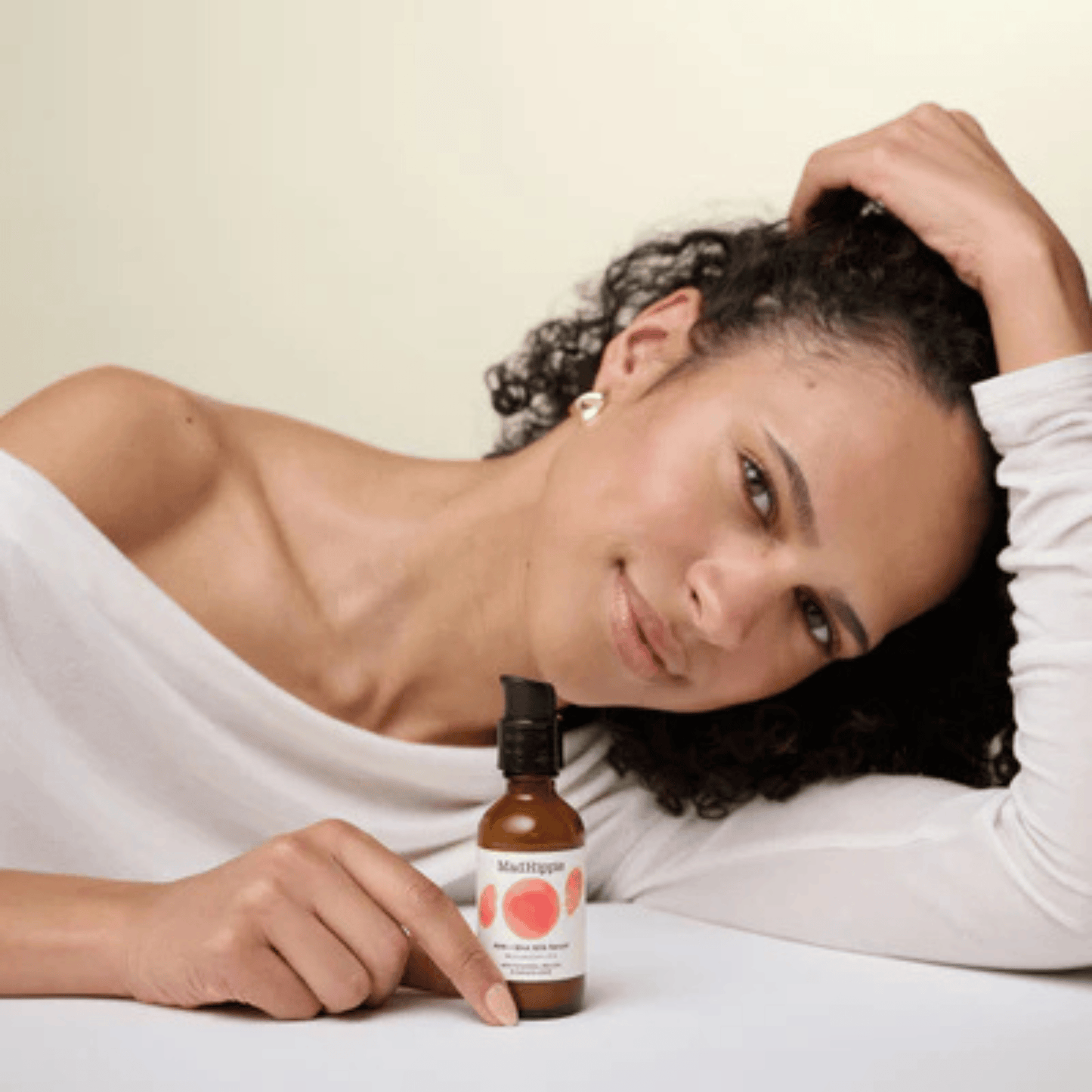 Alternate Image of AHA + BHA Milk Serum, dark amber glass pump top bottle with model