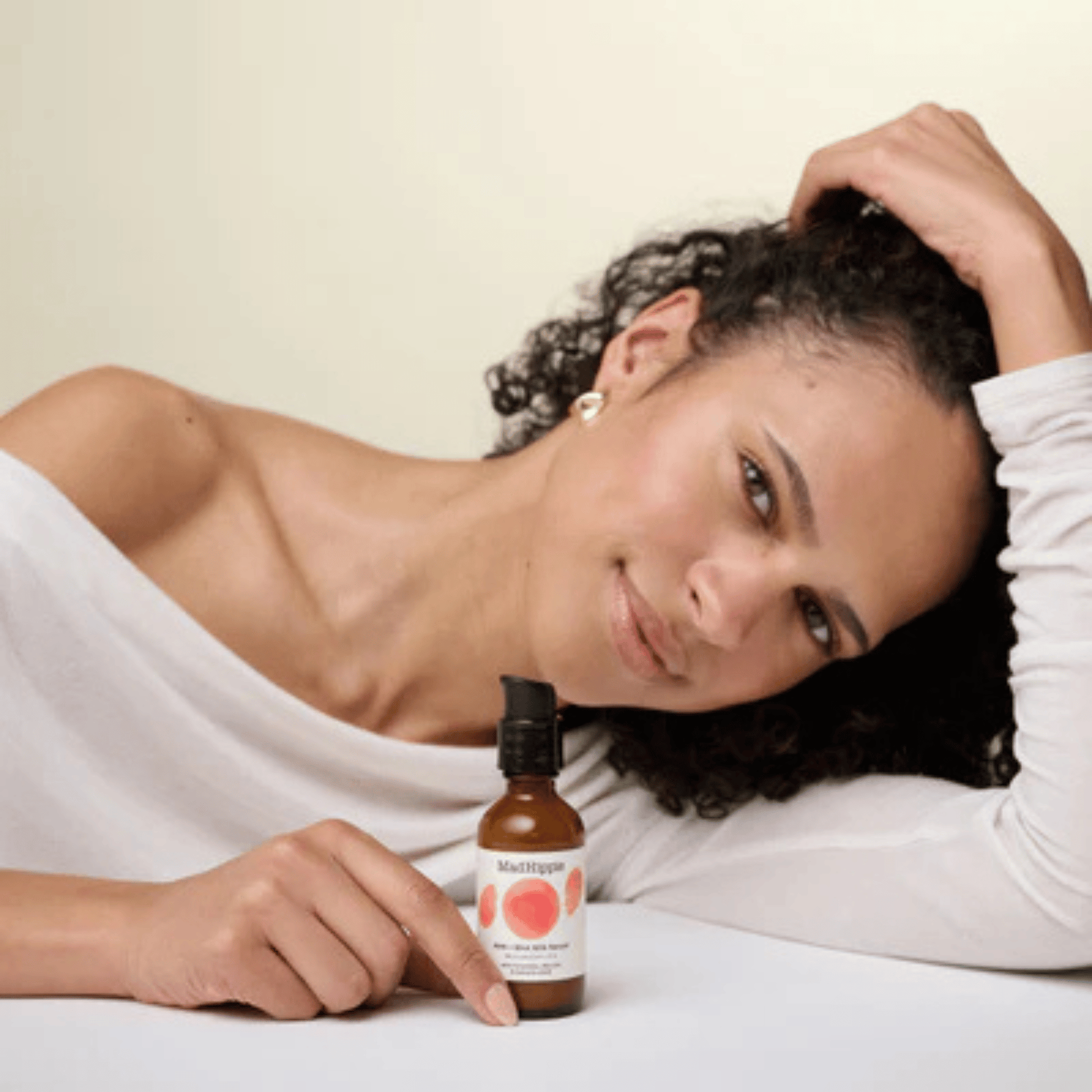 Alternate Image of AHA + BHA Milk Serum, dark amber glass pump top bottle with model