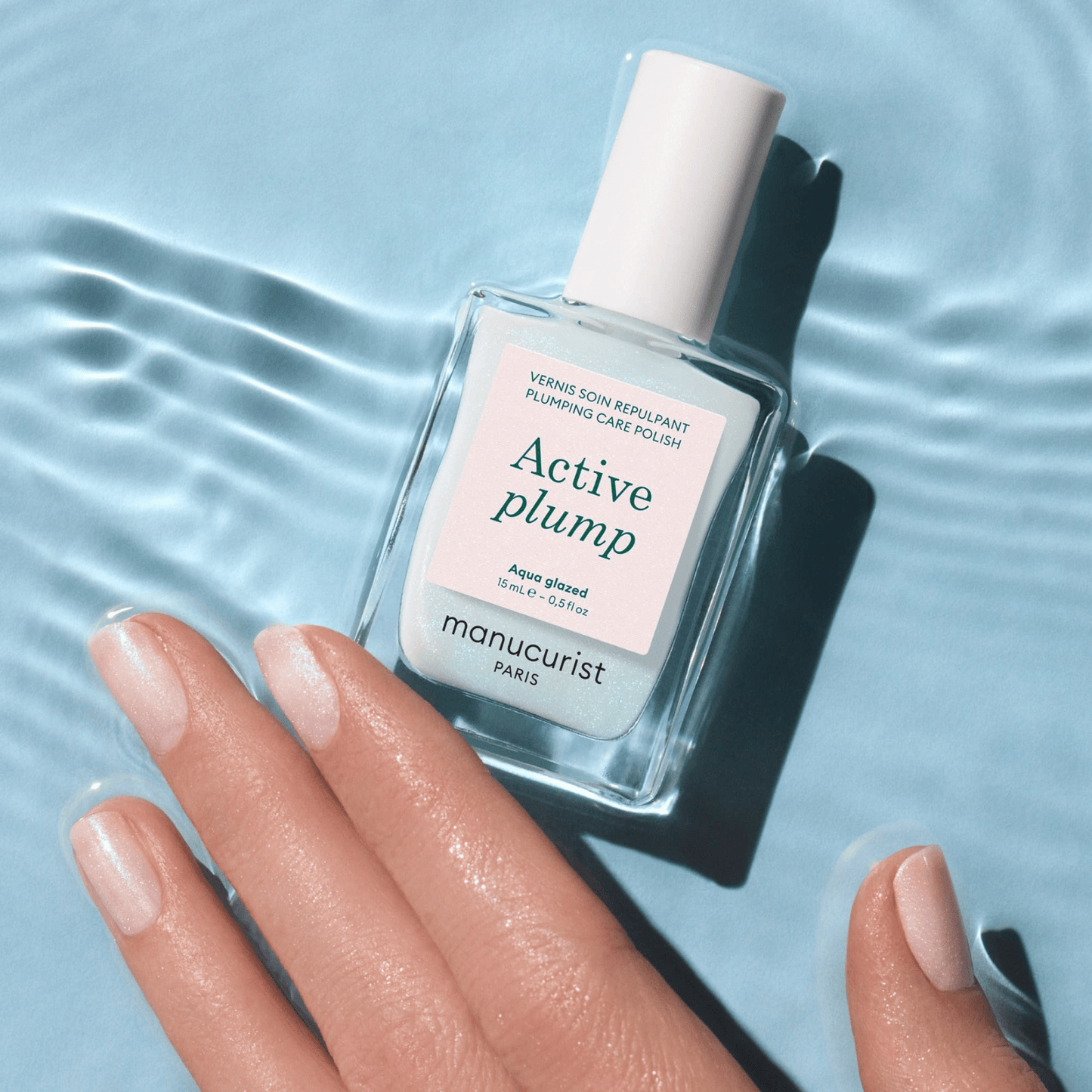 Alternate Image of Active Plump Aqua Glazed, light blue nail polish with model