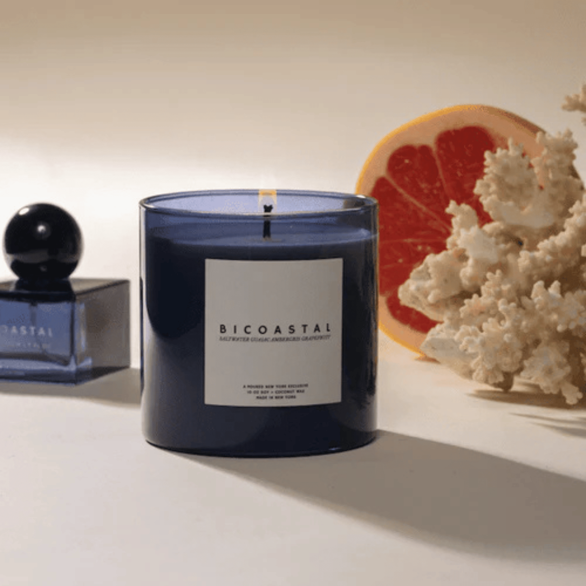Alternate Image of Bicoastal Candle, blue glass candle with white label