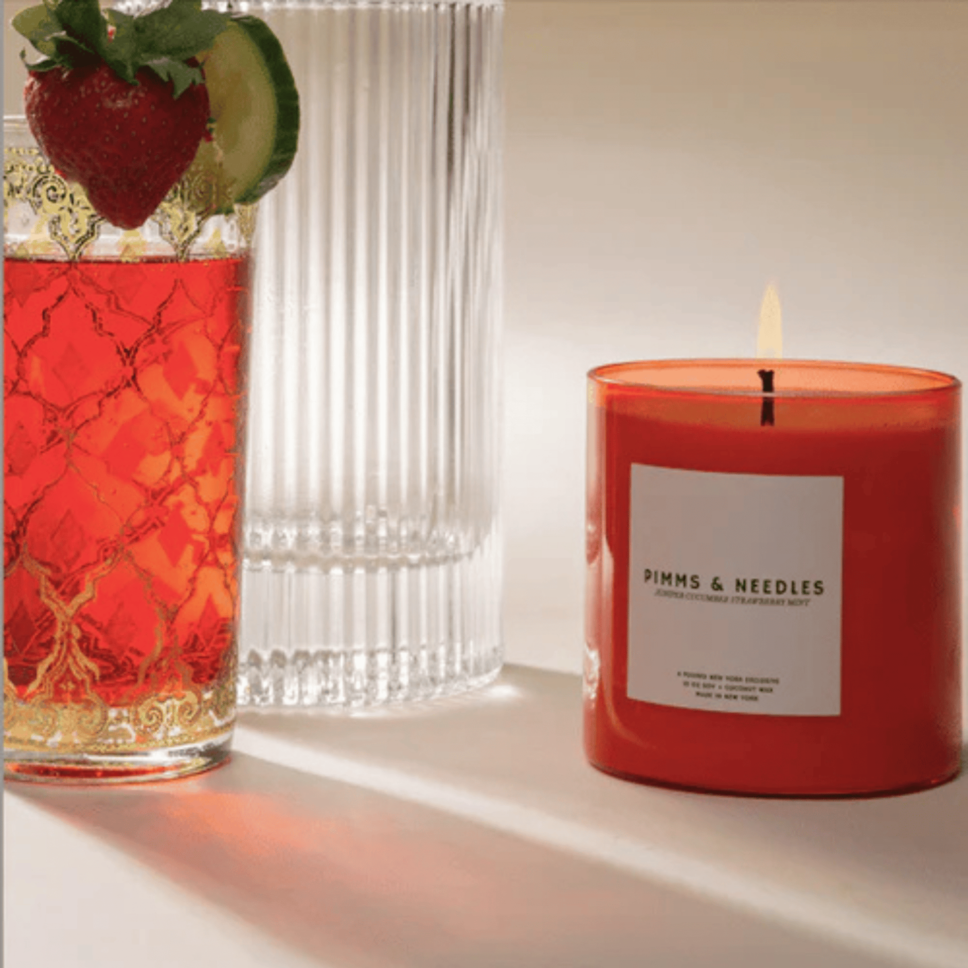 Alternate Image of Pimms & Needles Candle, red candle vessel with white label