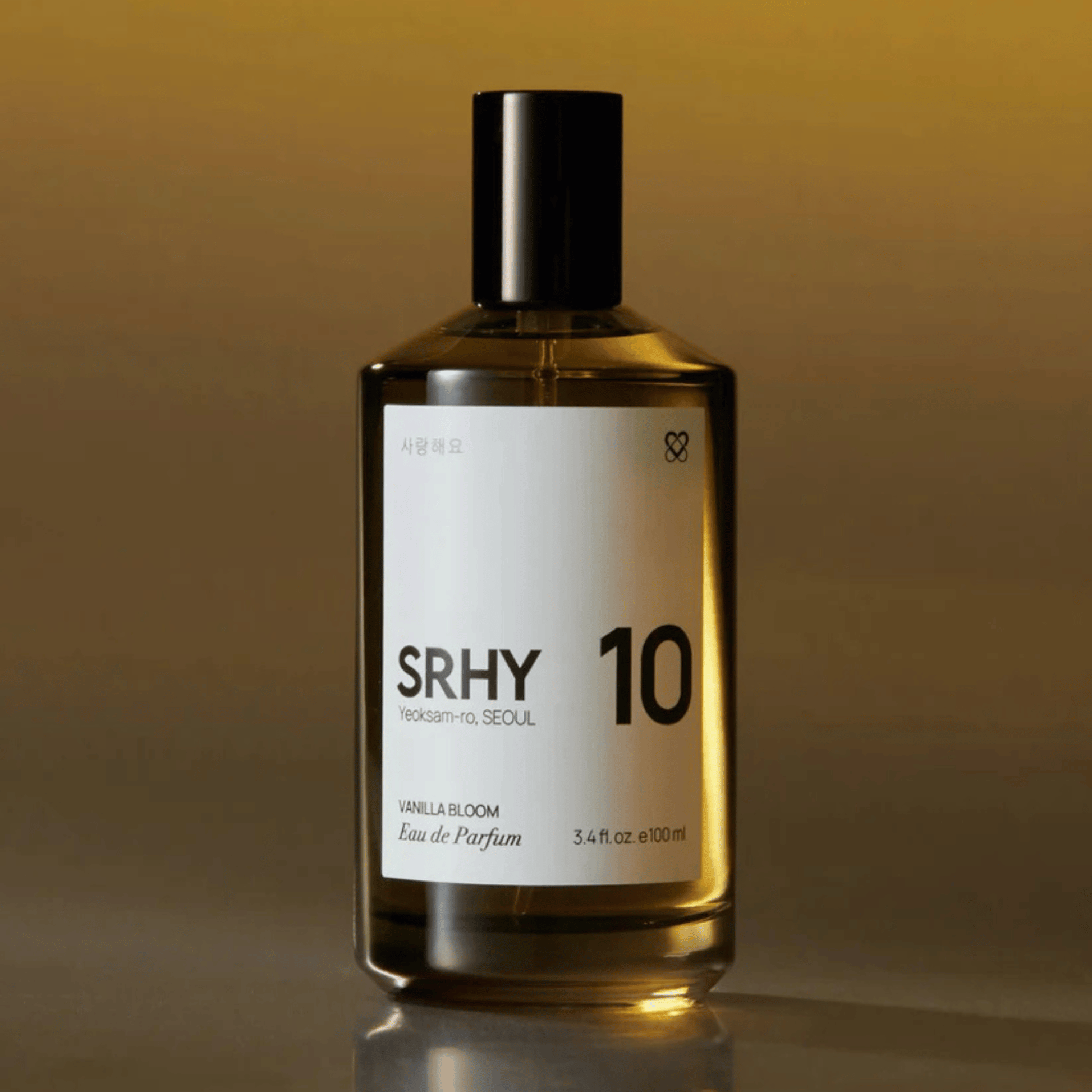 Alternate Image of 10. Vanilla Bloom EDP, brown perfume bottle with white label