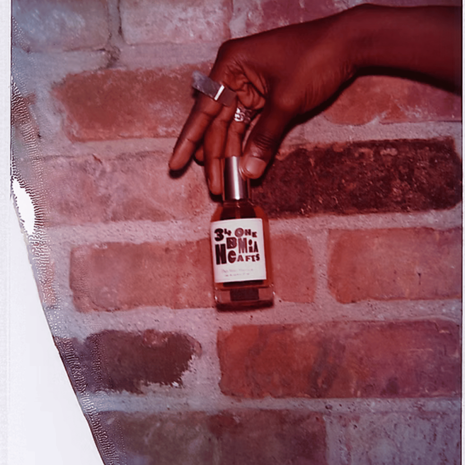 Alternate Image of 34 Bohemian Cafes EDP, fragrance bottle with model