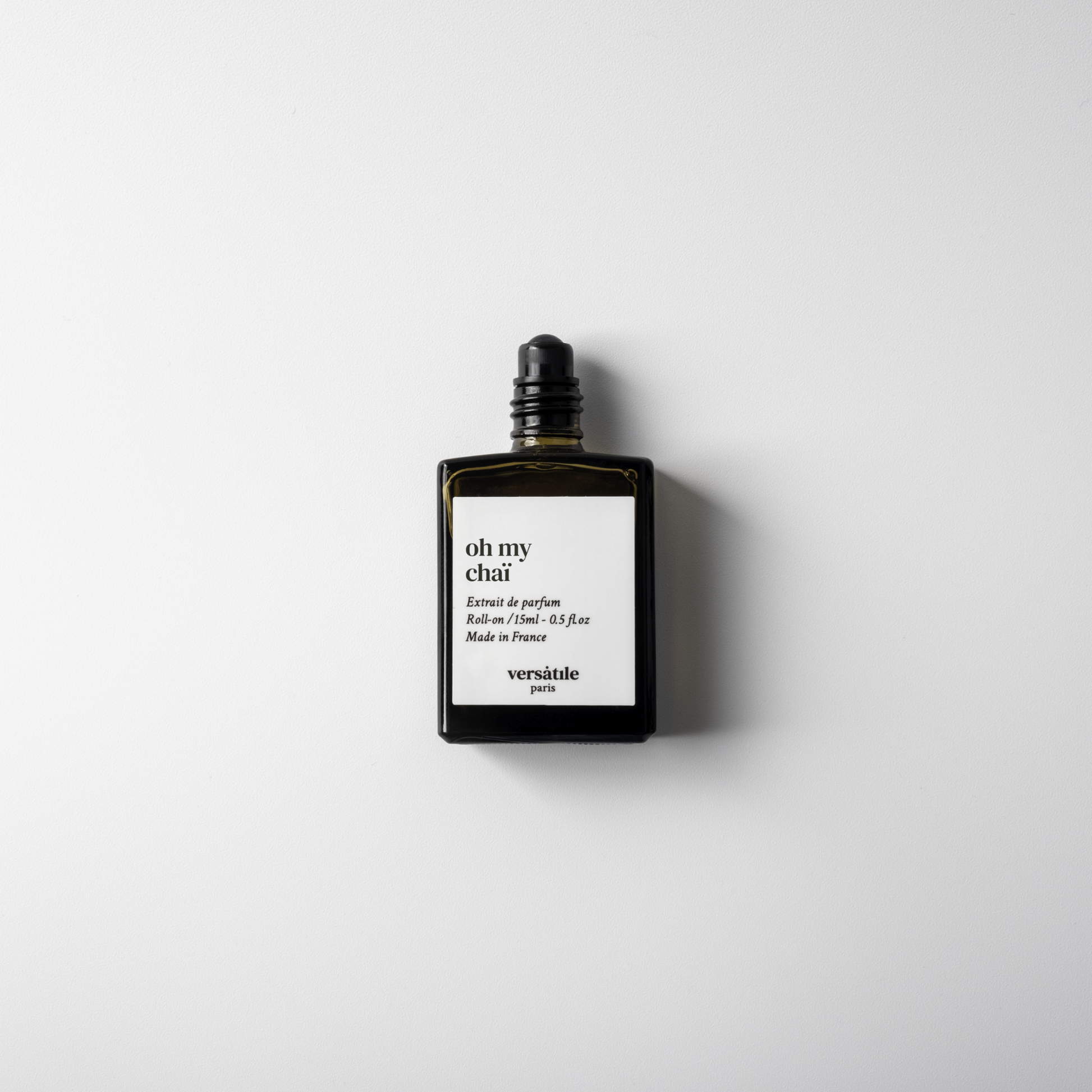 Alternate Image of Oh My Chai Extrait de Parfum Roll-On, dark perfume bottle with cap off showing roller ball