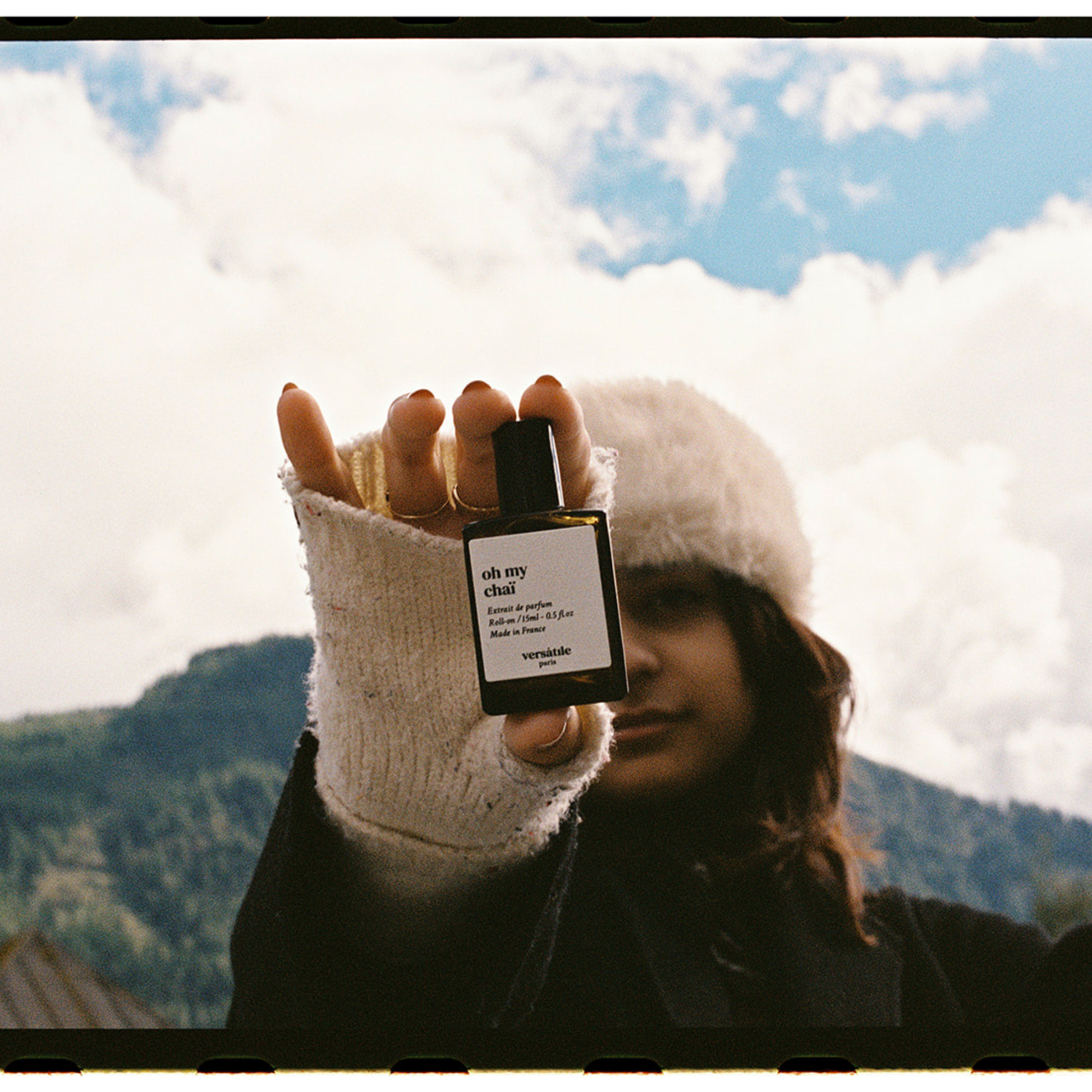 Alternate Image of Oh My Chai Extrait de Parfum Roll-On, dark perfume bottle with person holding it
